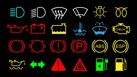 Übersicht der verschiedenen Kontrollleuchten im Auto in den Farben gelb, rot, weiß, orange, grün und blau.