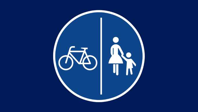 Verkehrsschild: Getrennter Fuß- und Radweg.